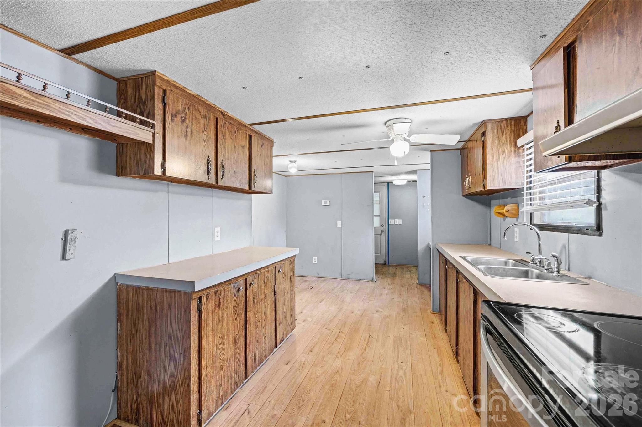 1612 Honeysuckle Pond Road Rock Hill, SC 29732 - Photo 7 of 26 a kitchen that has a lot of cabinets in it