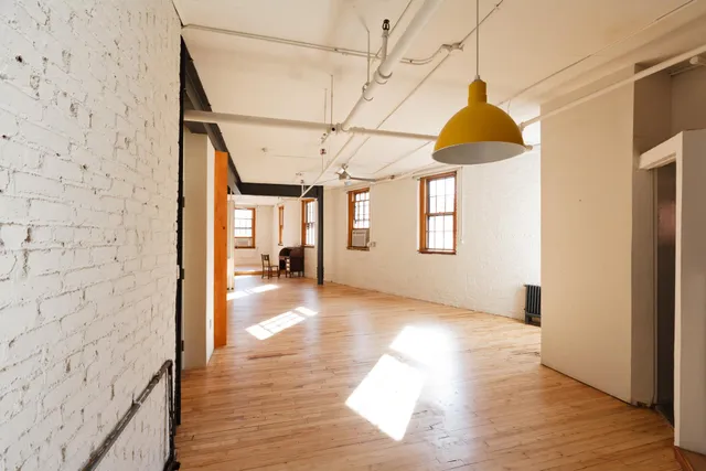 a view interior of a house wooden floor and windows