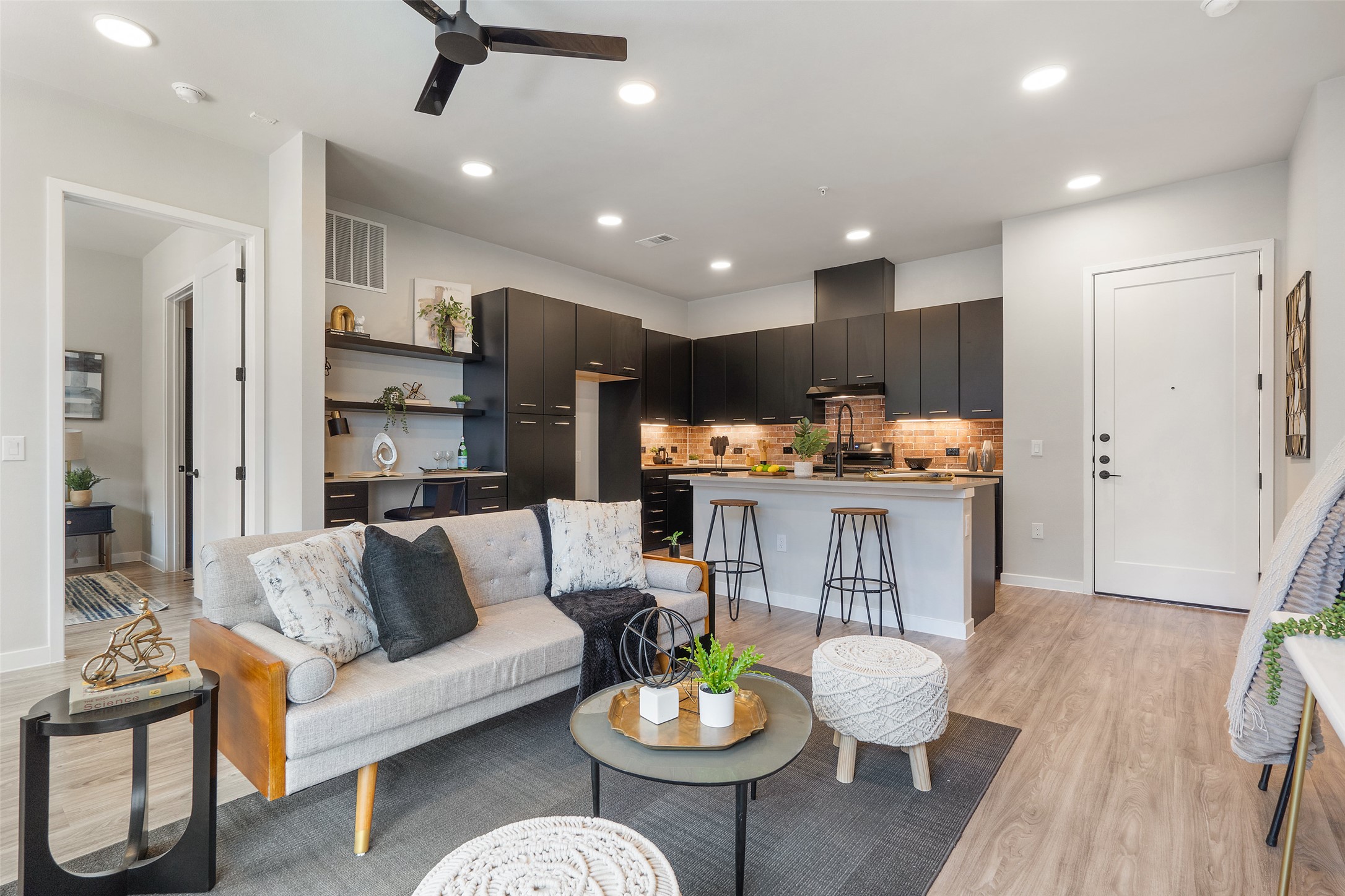 4510 Terry-O Lane, Unit 341 Austin, TX 78745 - Photo 14 of 40 Open-concept living space featuring light wood-style flooring and recessed lighting