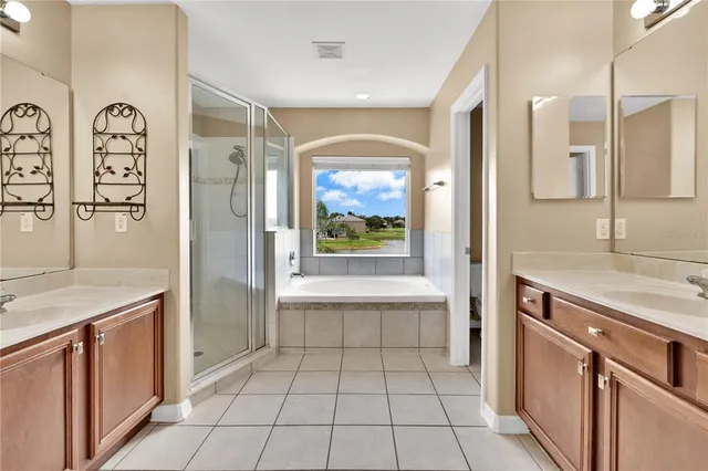 a bathroom with a sink a vanity and a mirror