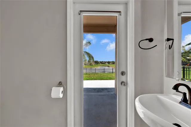 a bathroom with a tub and shower