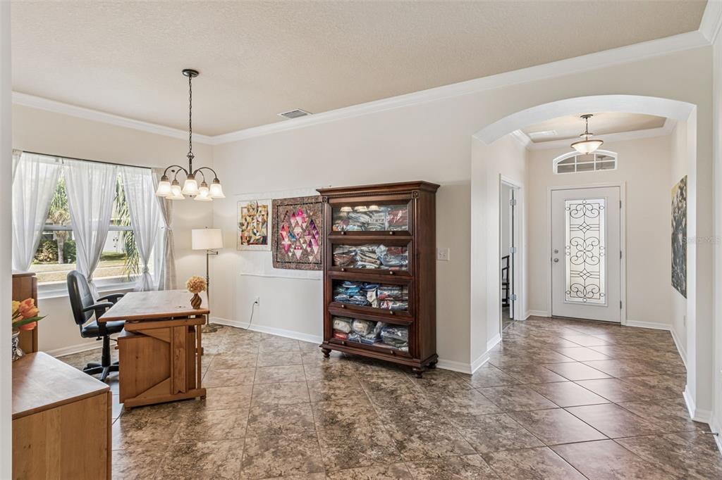 31518 Bearded Oak Drive Wesley Chapel, FL 33543 - Photo 8 of 56 a view of a livingroom with wooden floor and a window