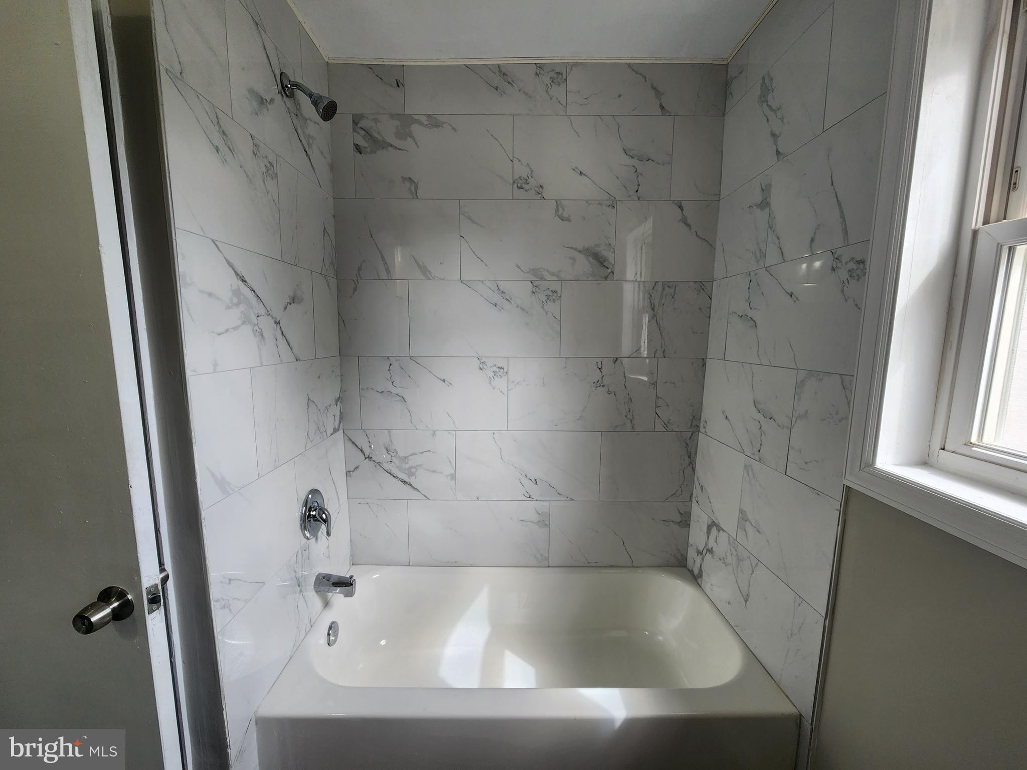 10 Webster Avenue Stratford, NJ 08084 - Photo 19 of 20 a close view of a bathtub in bathroom