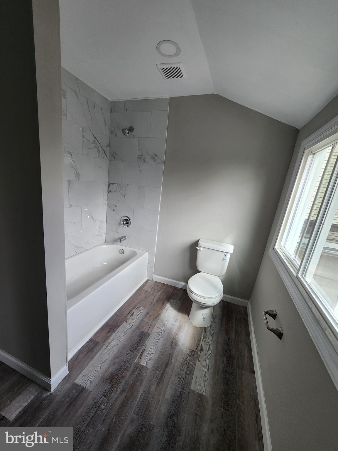 10 Webster Avenue Stratford, NJ 08084 - Photo 20 of 20 a bathroom with a bathtub and a toilet