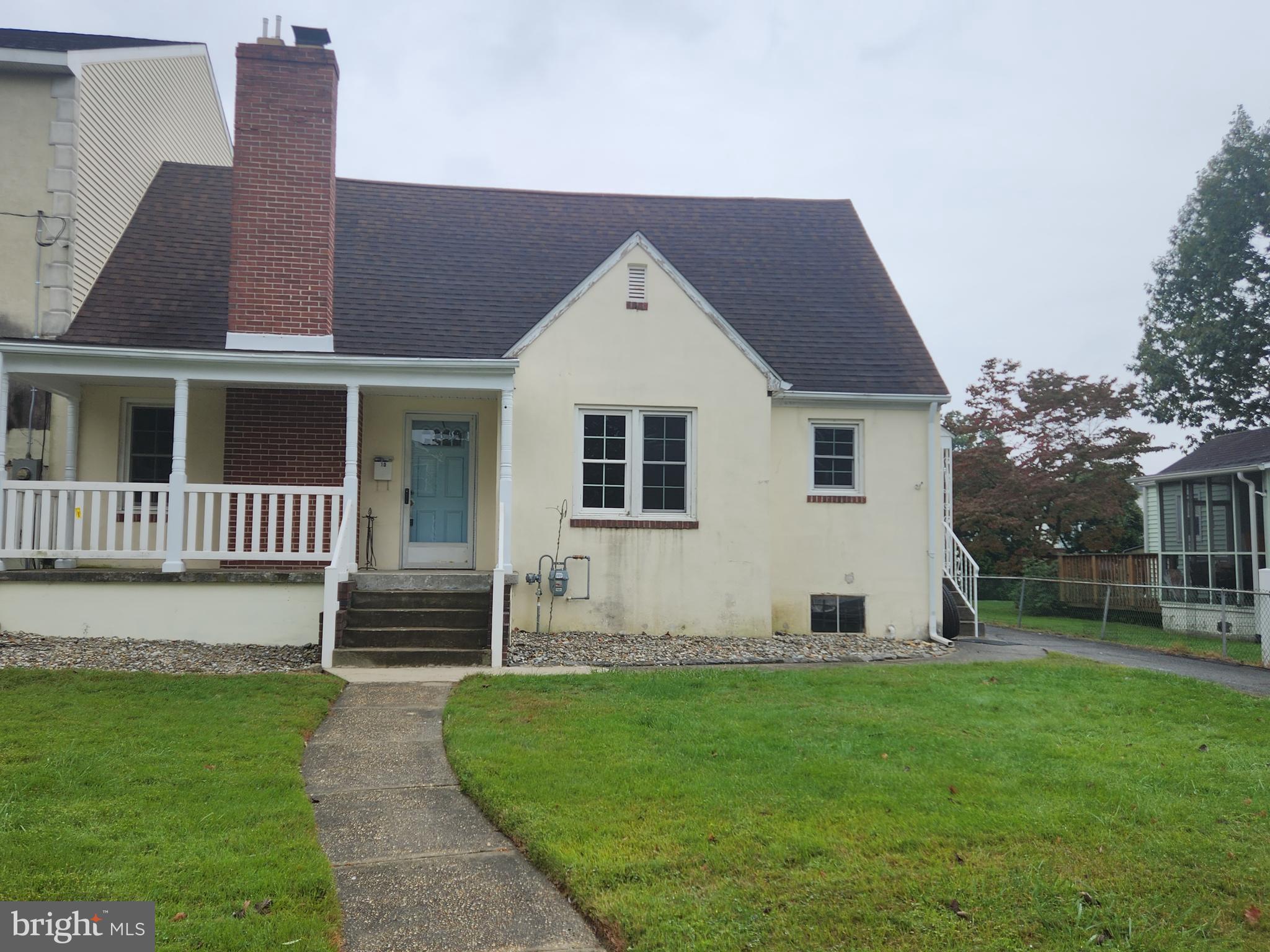 10 Webster Avenue Stratford, NJ 08084 - Photo 2 of 20 a front view of a house with a yard