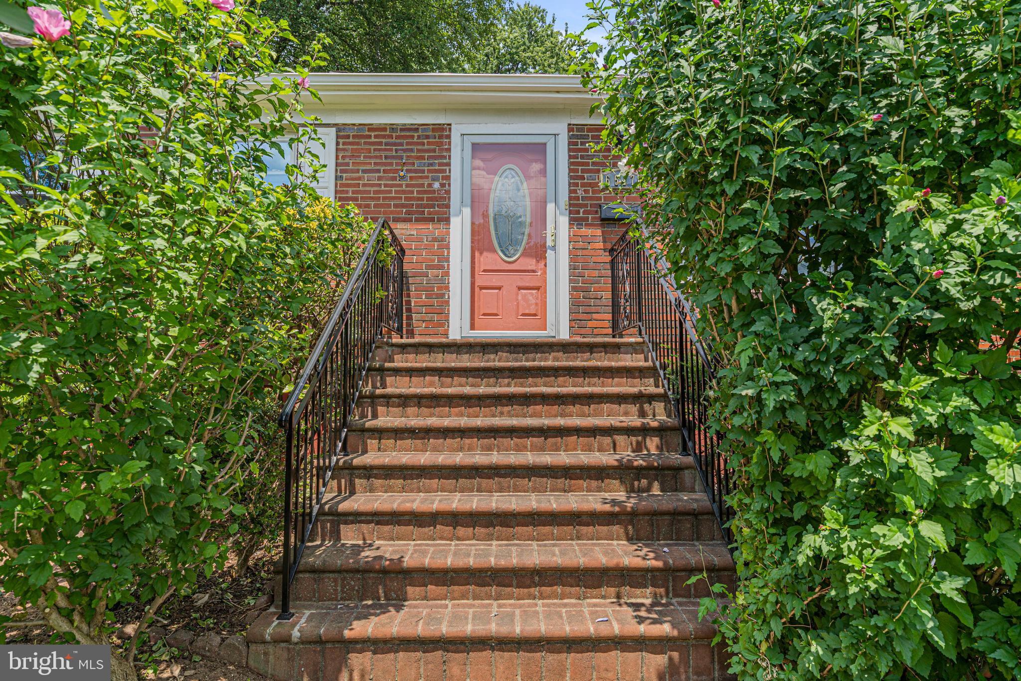 6517 29th Street North Arlington, VA 22213 - Photo 2 of 49 a view of a house with a small yard