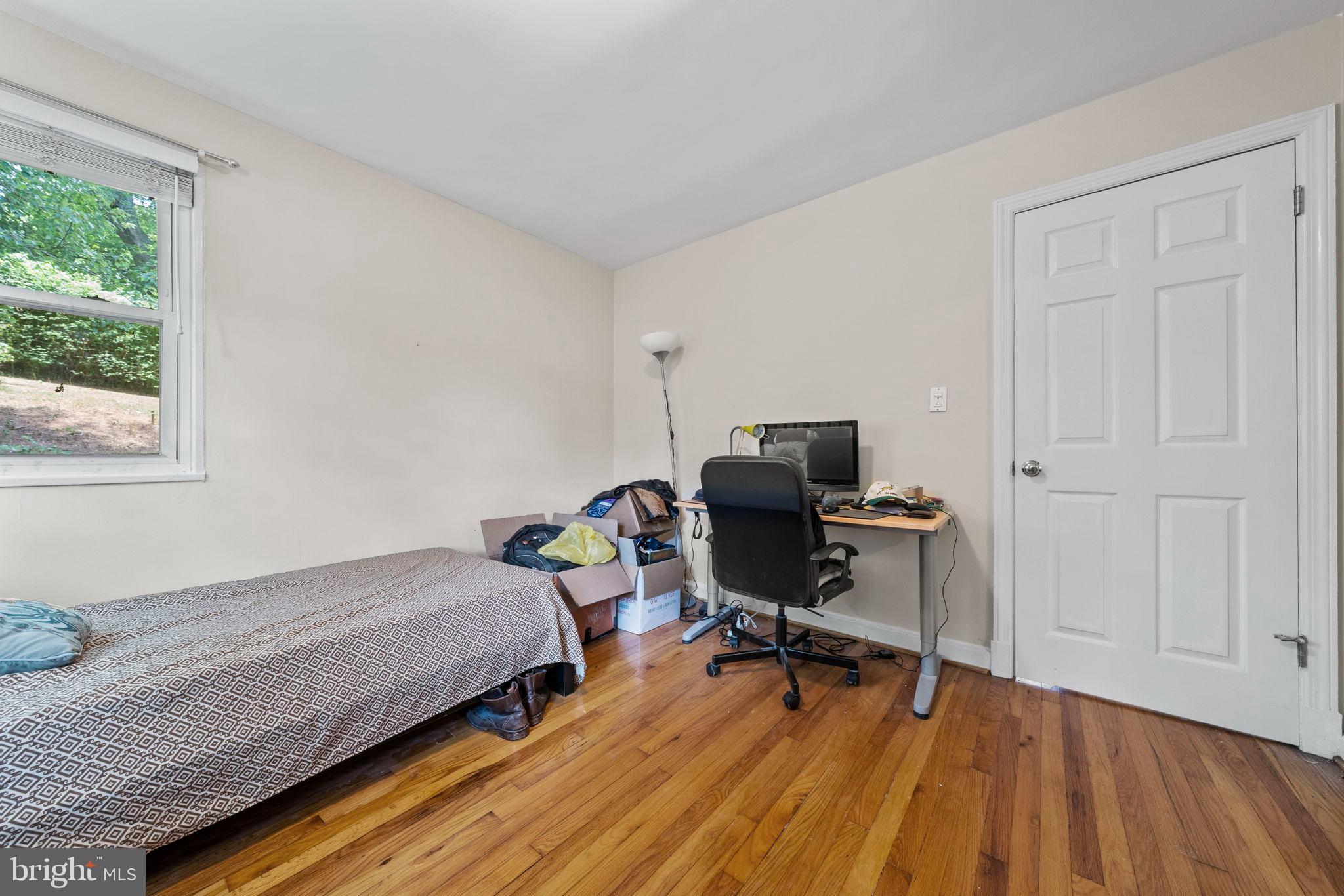 6517 29th Street North Arlington, VA 22213 - Photo 25 of 49 a bedroom with a bed and a desk