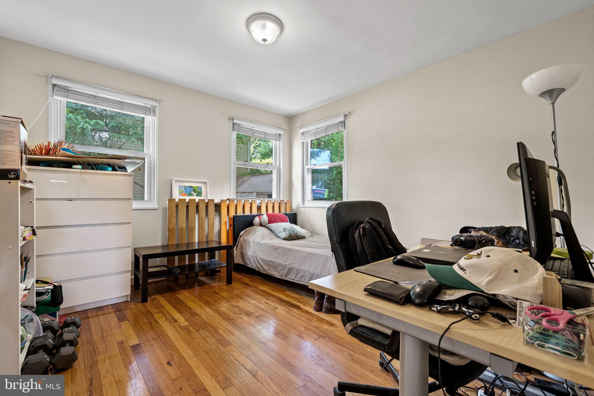 6517 29th Street North Arlington, VA 22213 - Photo 26 of 49 a bedroom with furniture and a wooden floor