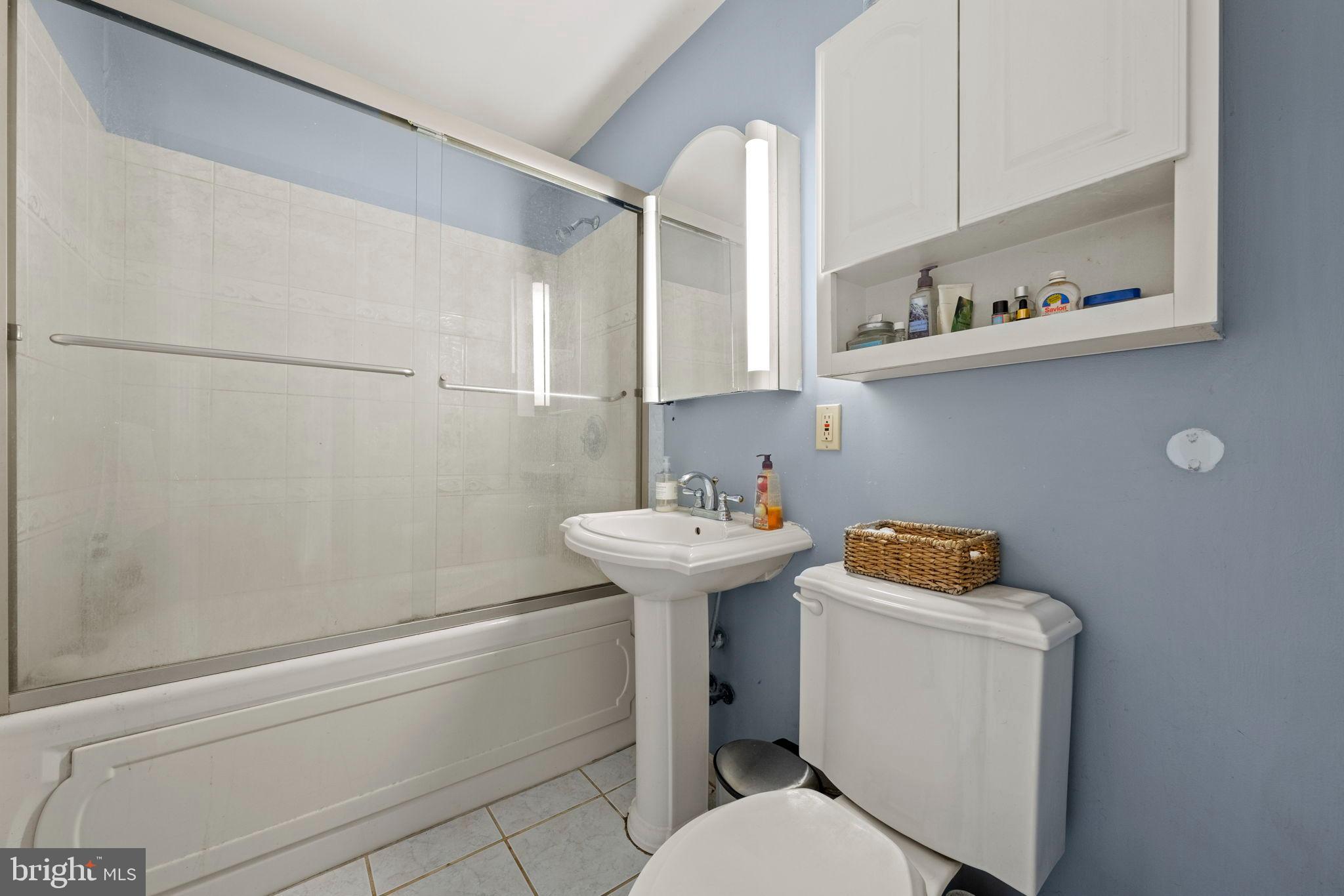 6517 29th Street North Arlington, VA 22213 - Photo 27 of 49 a bathroom with a sink a toilet and a bathtub