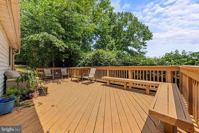 a view of balcony with seating space and trees