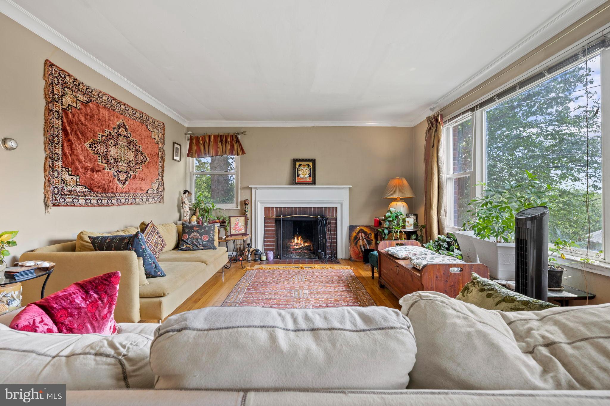 6517 29th Street North Arlington, VA 22213 - Photo 6 of 49 a living room with furniture and a fireplace