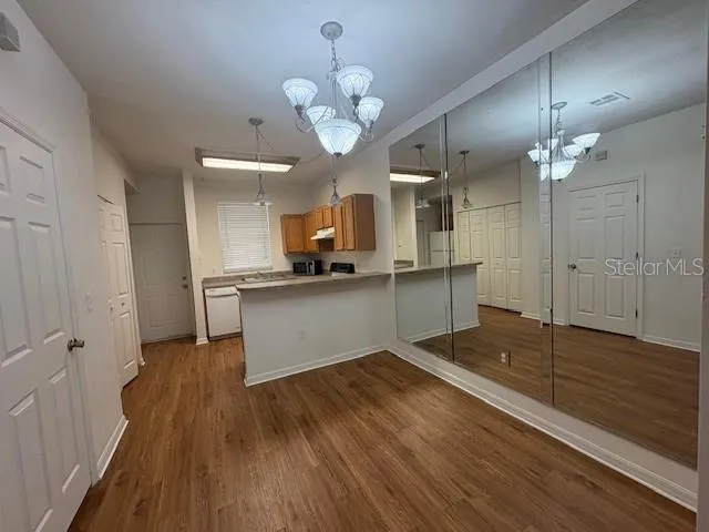 a view of a room that has a window in it