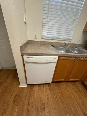 a view of a house with a park