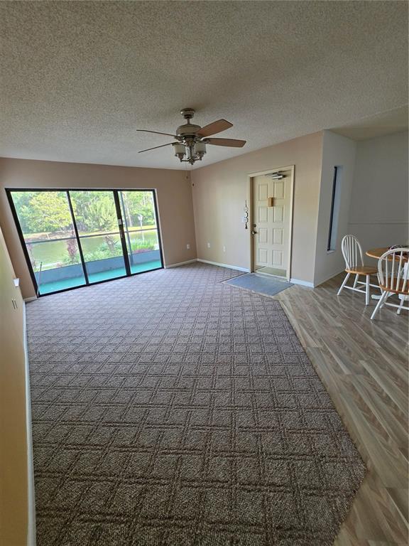 1281 Pine Ridge Circle East, Unit B1 Tarpon Springs, FL 34688 - Photo 4 of 30 a view of an empty room with a window