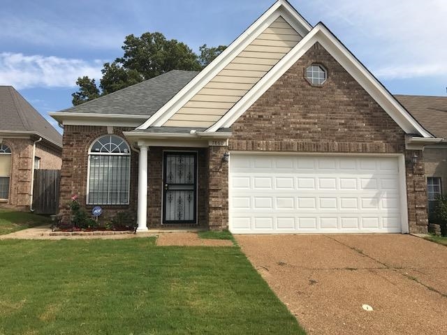 7860 Windy Willow Road Memphis, TN 38125 - Photo 1 of 6 a front view of a house