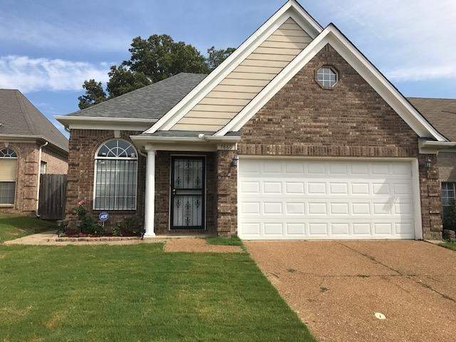 7860 Windy Willow Road Memphis, TN 38125 - Photo 3 of 6 a front view of a house