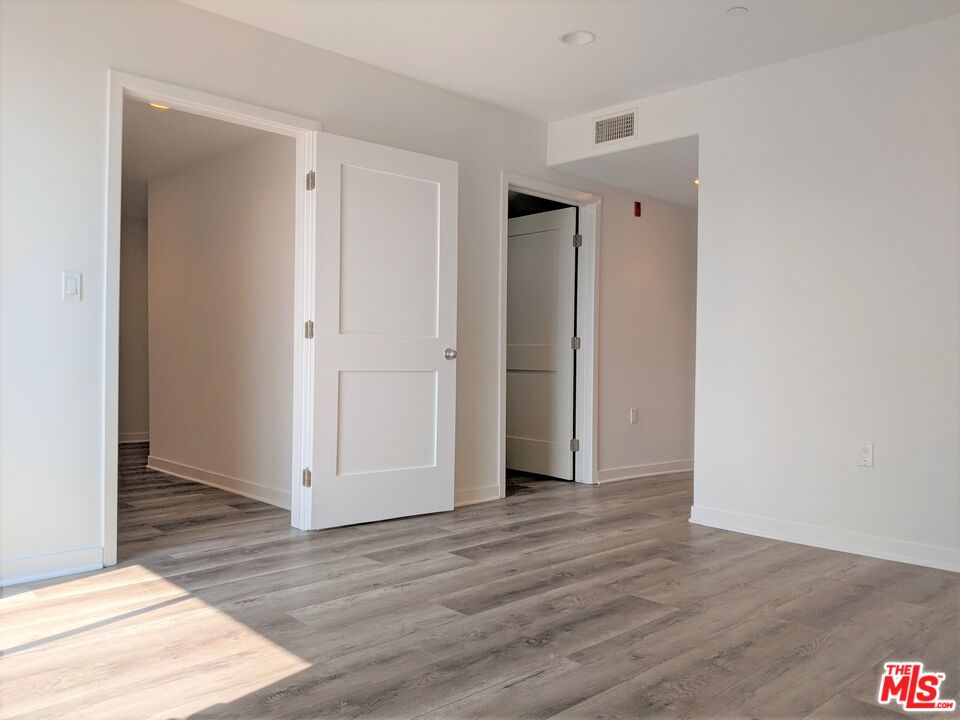 5143 White Oak Avenue, Unit 306 Encino, CA 91316 - Photo 28 of 32 a view of entryway with wooden floor
