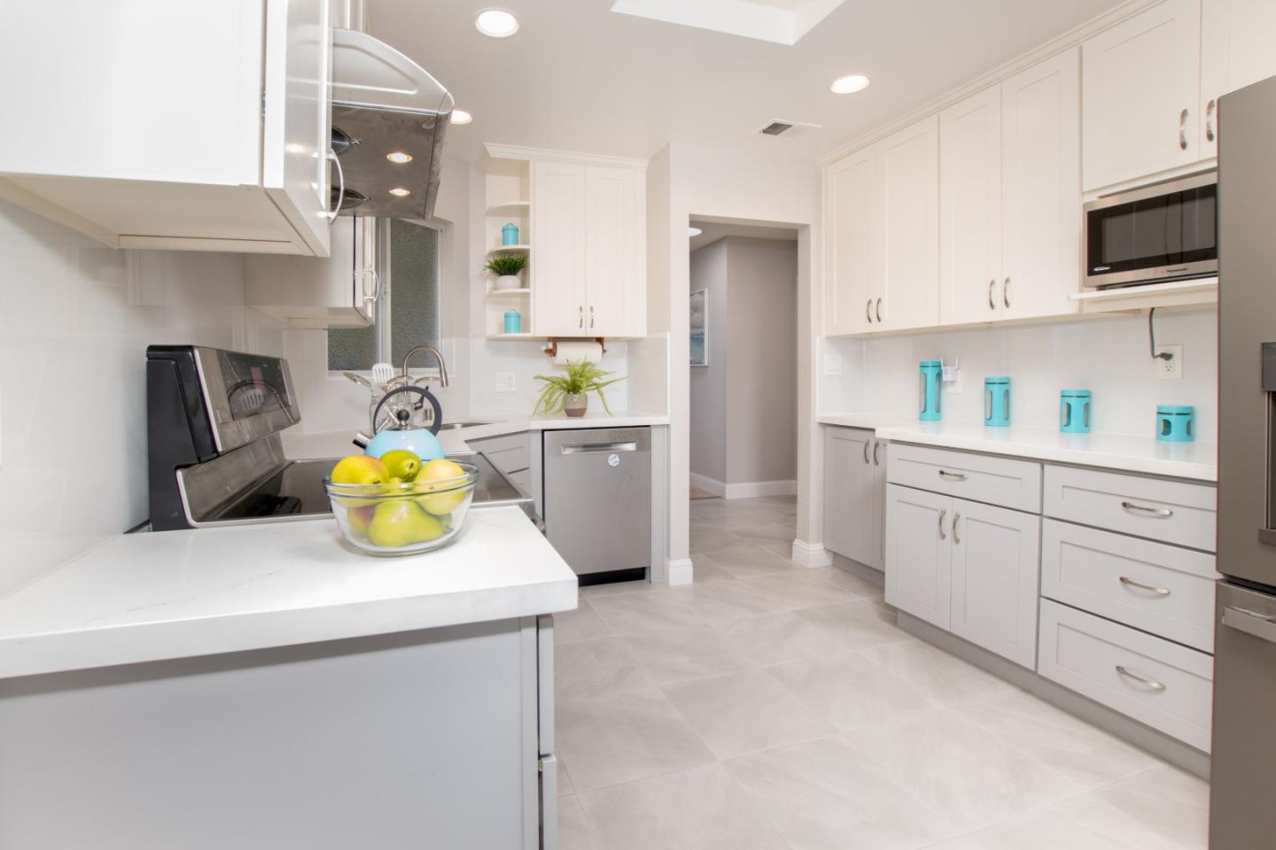 3416 Tracy Drive Santa Clara, CA 95051 - Photo 11 of 26 a kitchen with a sink a stove and refrigerator