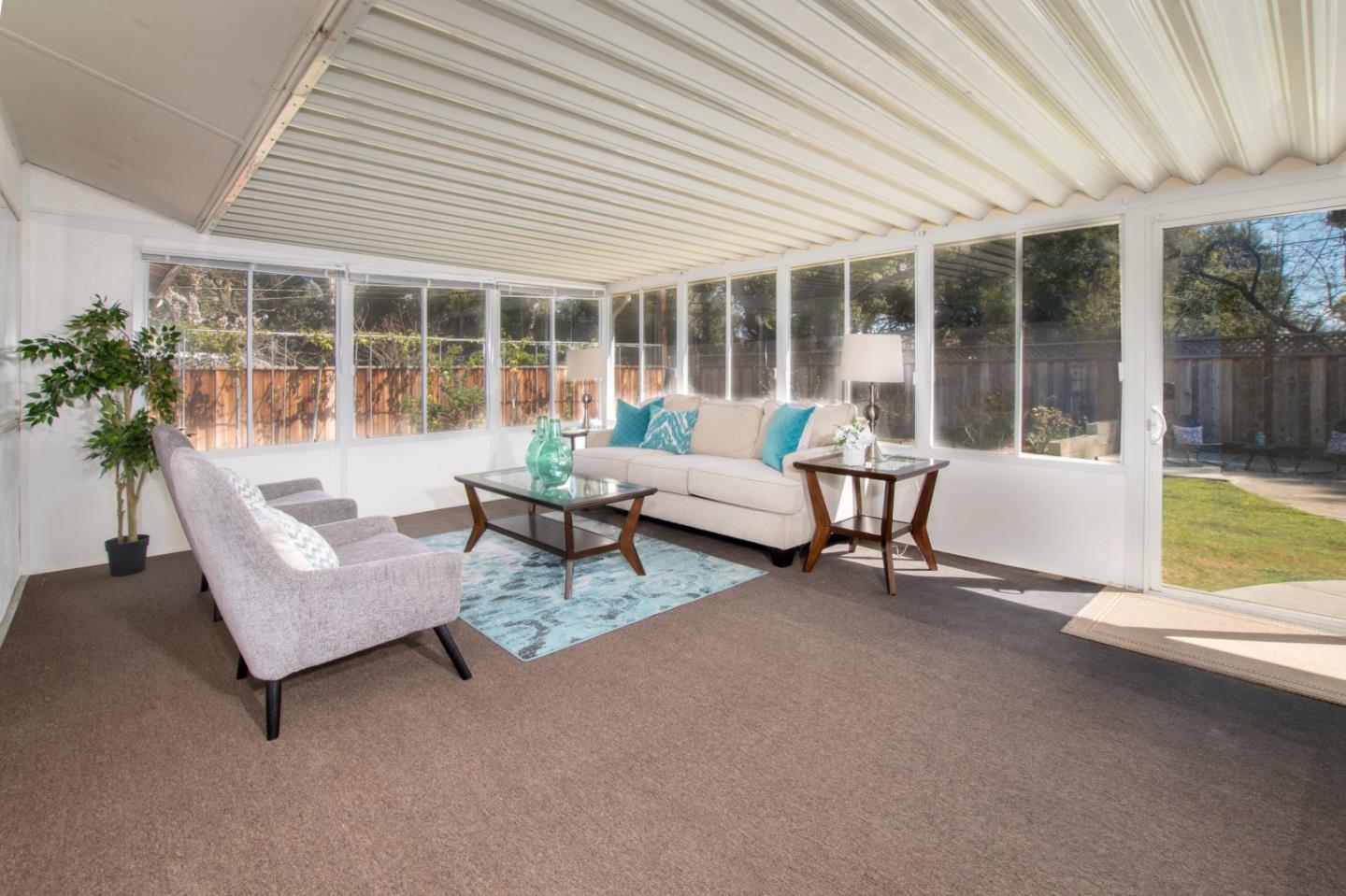 3416 Tracy Drive Santa Clara, CA 95051 - Photo 20 of 26 a living room with furniture and a large window