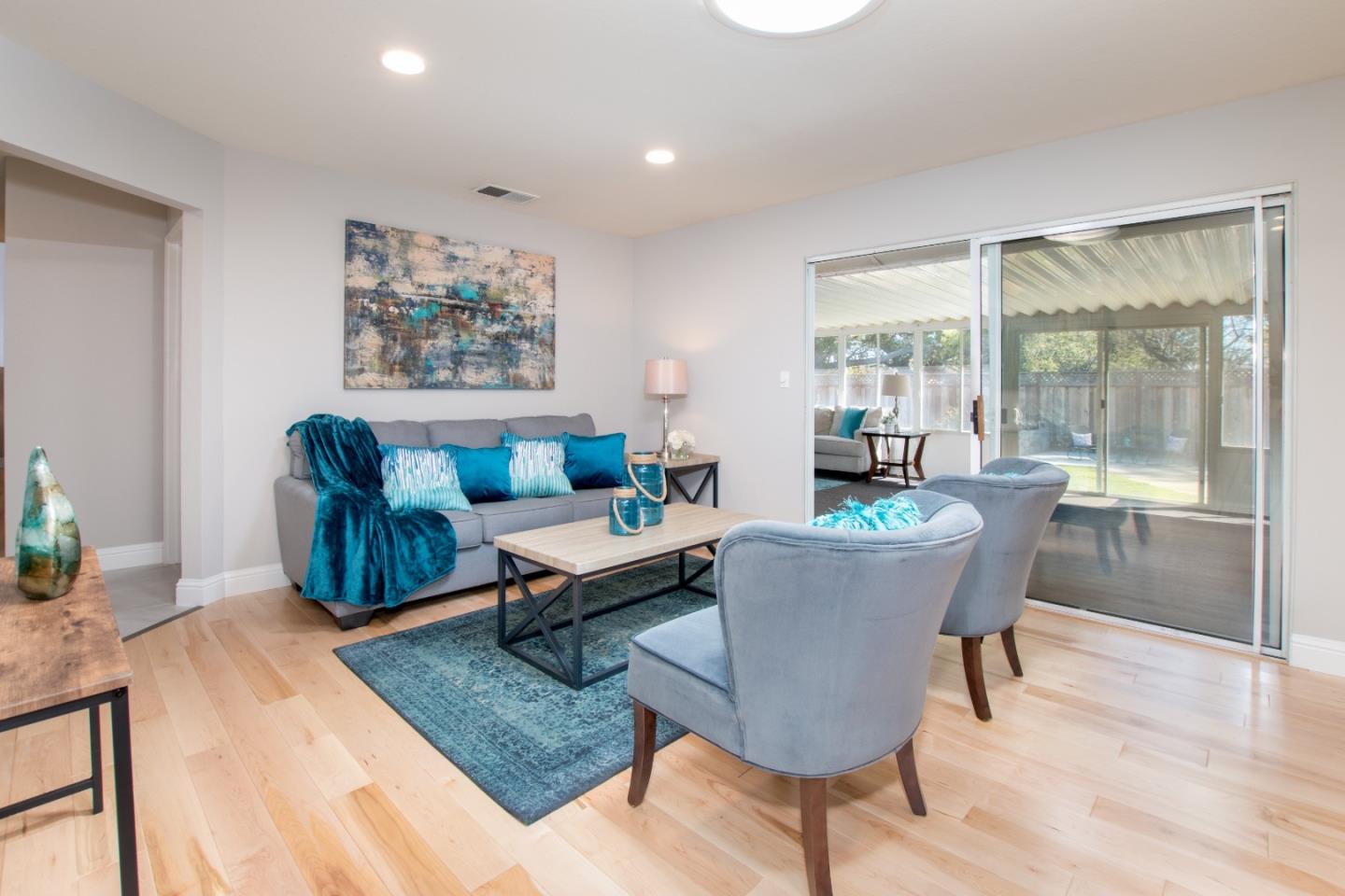 3416 Tracy Drive Santa Clara, CA 95051 - Photo 4 of 26 a living room with couches a coffee table and a potted plant