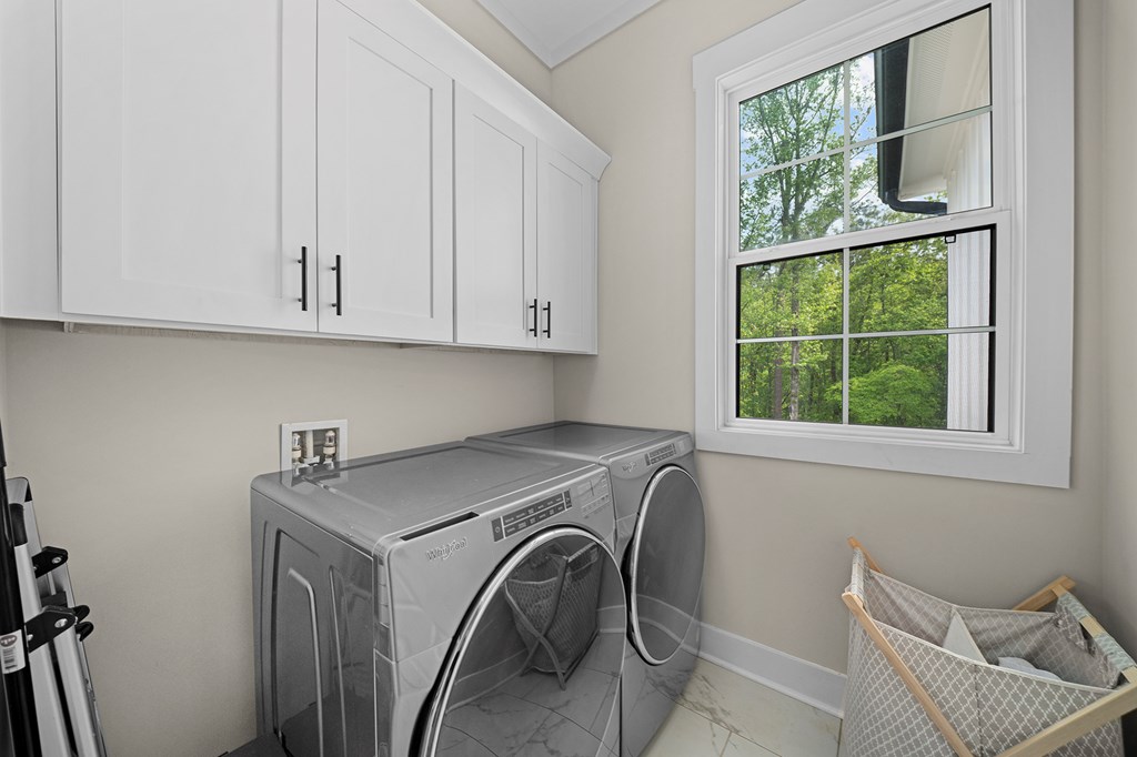 392 London Road Ball Ground, GA 30107 - Photo 23 of 60 a utility room with dryer and washer
