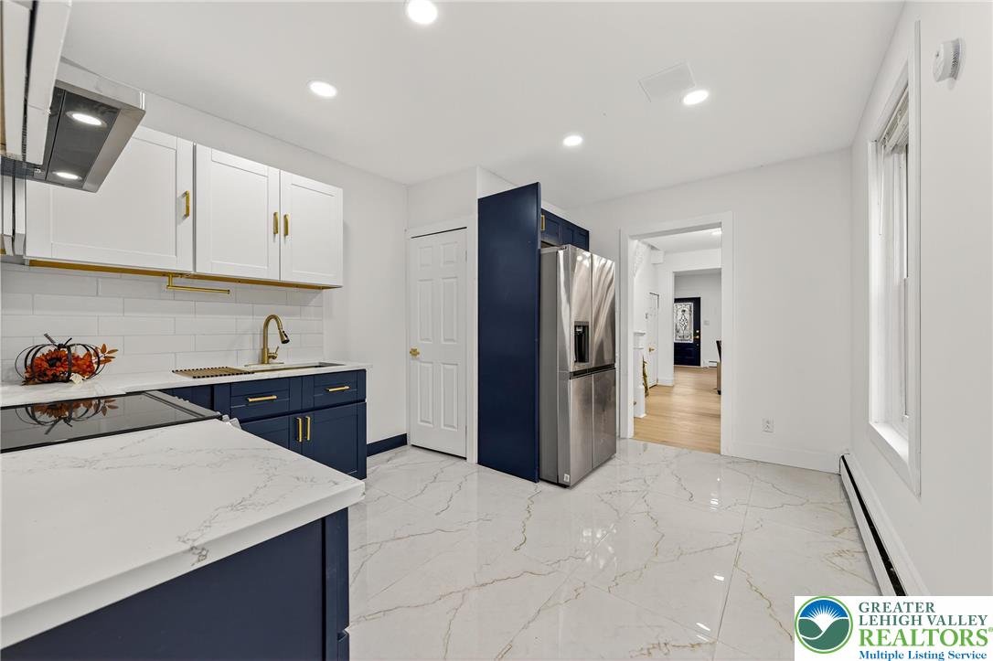43 Evergreen Street Nazareth, PA 18064 - Photo 15 of 39 a kitchen with a refrigerator and a sink