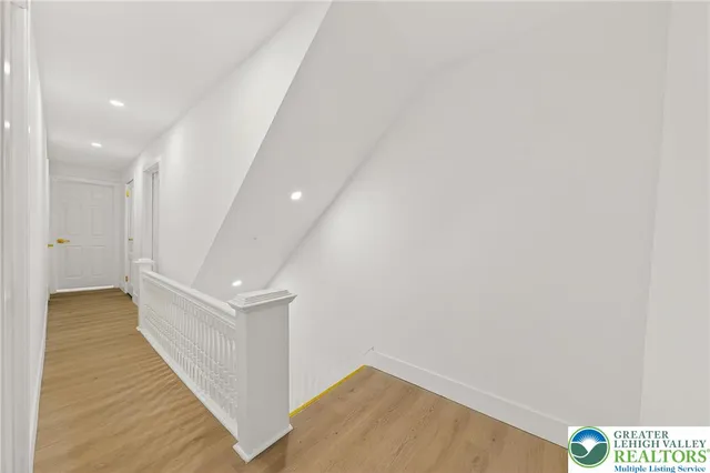 a view of hallway with stairs