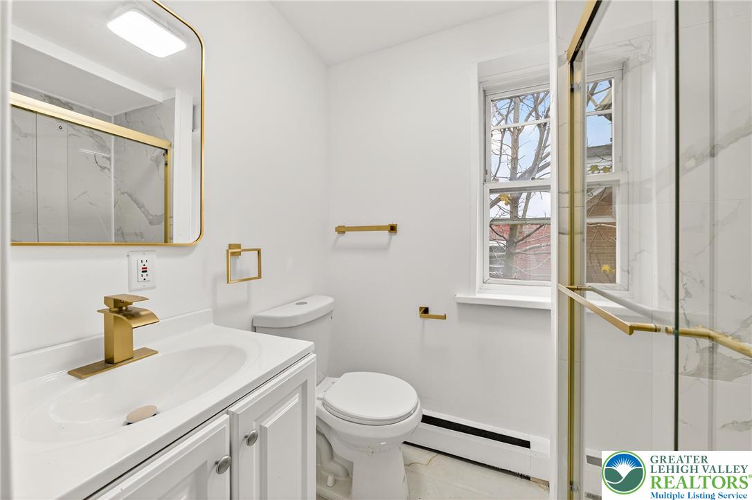 43 Evergreen Street Nazareth, PA 18064 - Photo 26 of 39 a bathroom with a sink toilet and shower