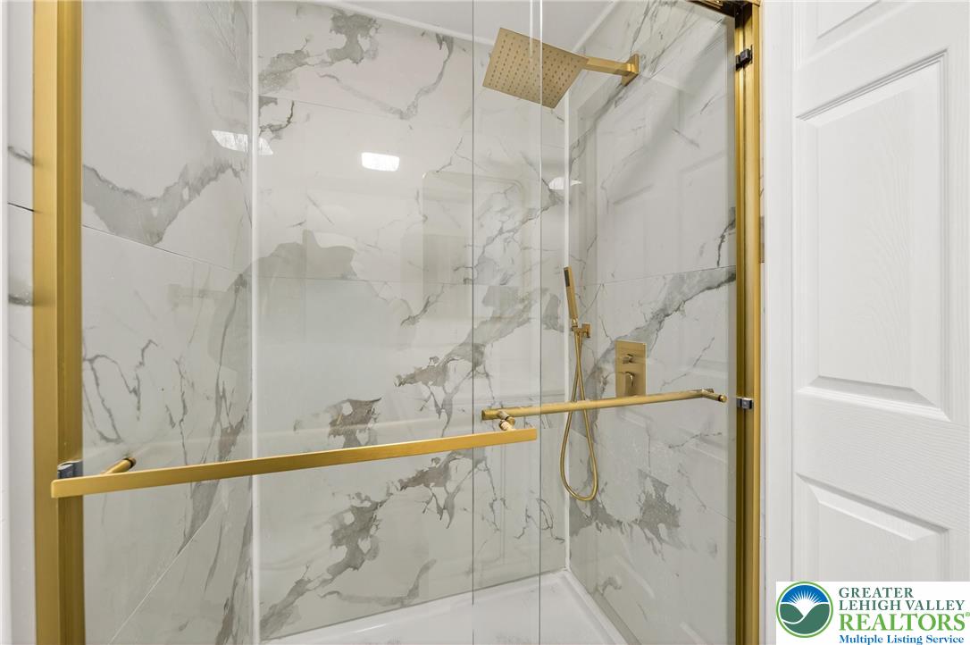 43 Evergreen Street Nazareth, PA 18064 - Photo 27 of 39 a bathroom with a shower and a sink