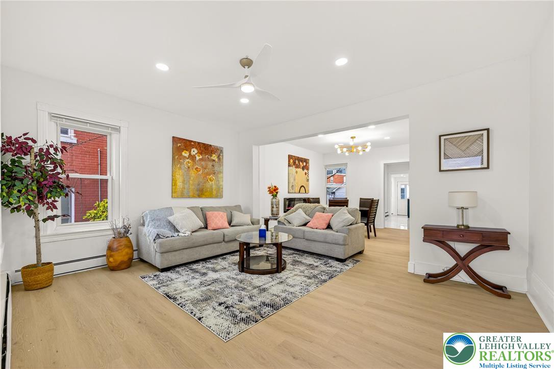 43 Evergreen Street Nazareth, PA 18064 - Photo 5 of 39 a living room with furniture or couch and a potted plant