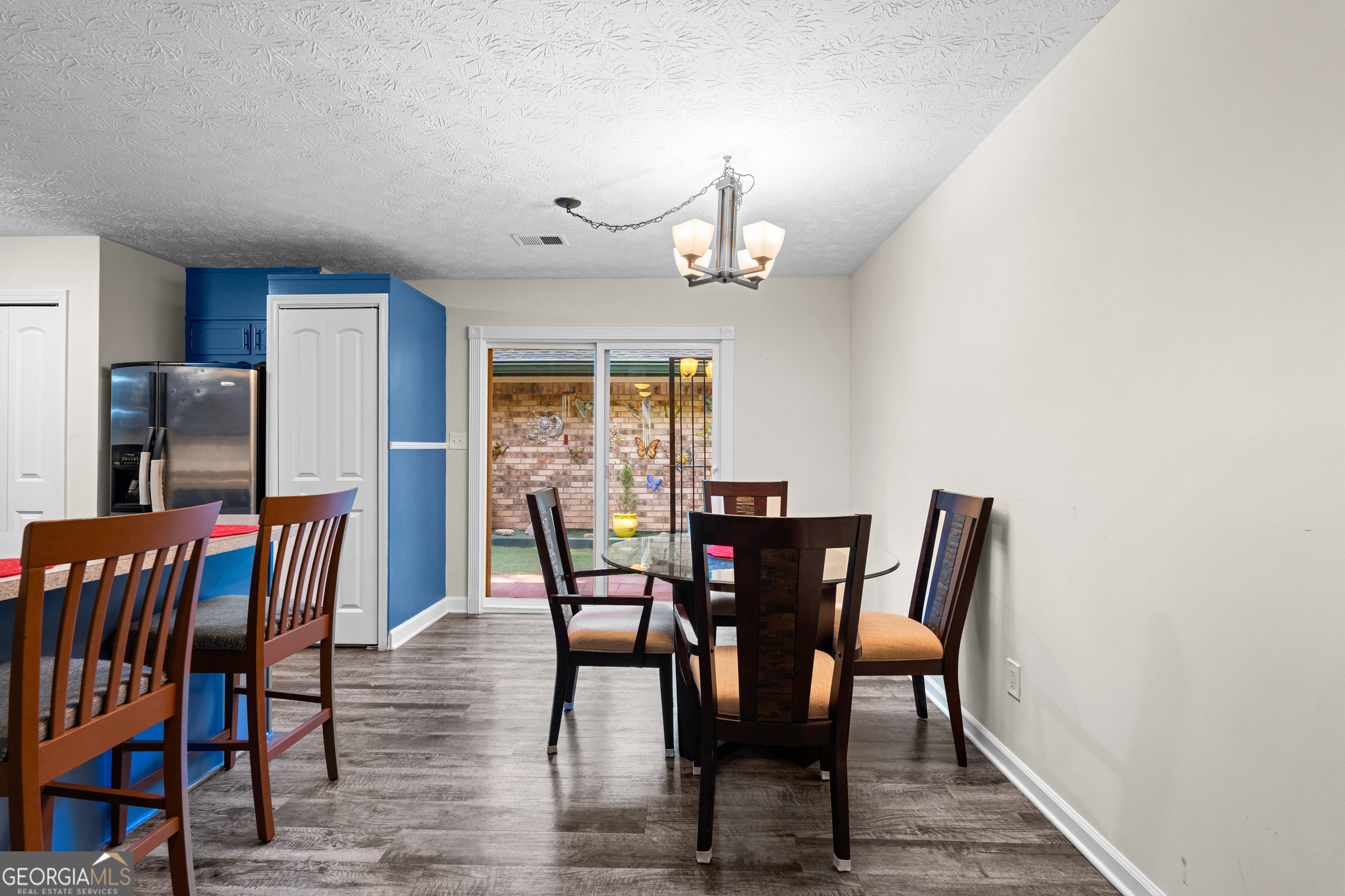 230 Ridge Road Tyrone, GA 30290 - Photo 12 of 47 a view of a dining room with furniture and wooden floor