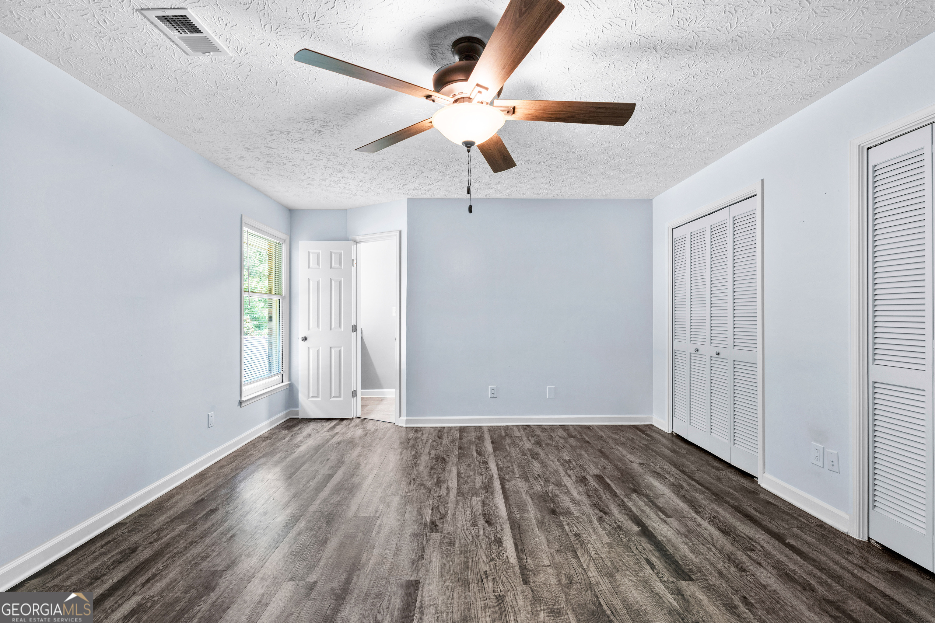 230 Ridge Road Tyrone, GA 30290 - Photo 20 of 47 wooden floor in an empty room with a window