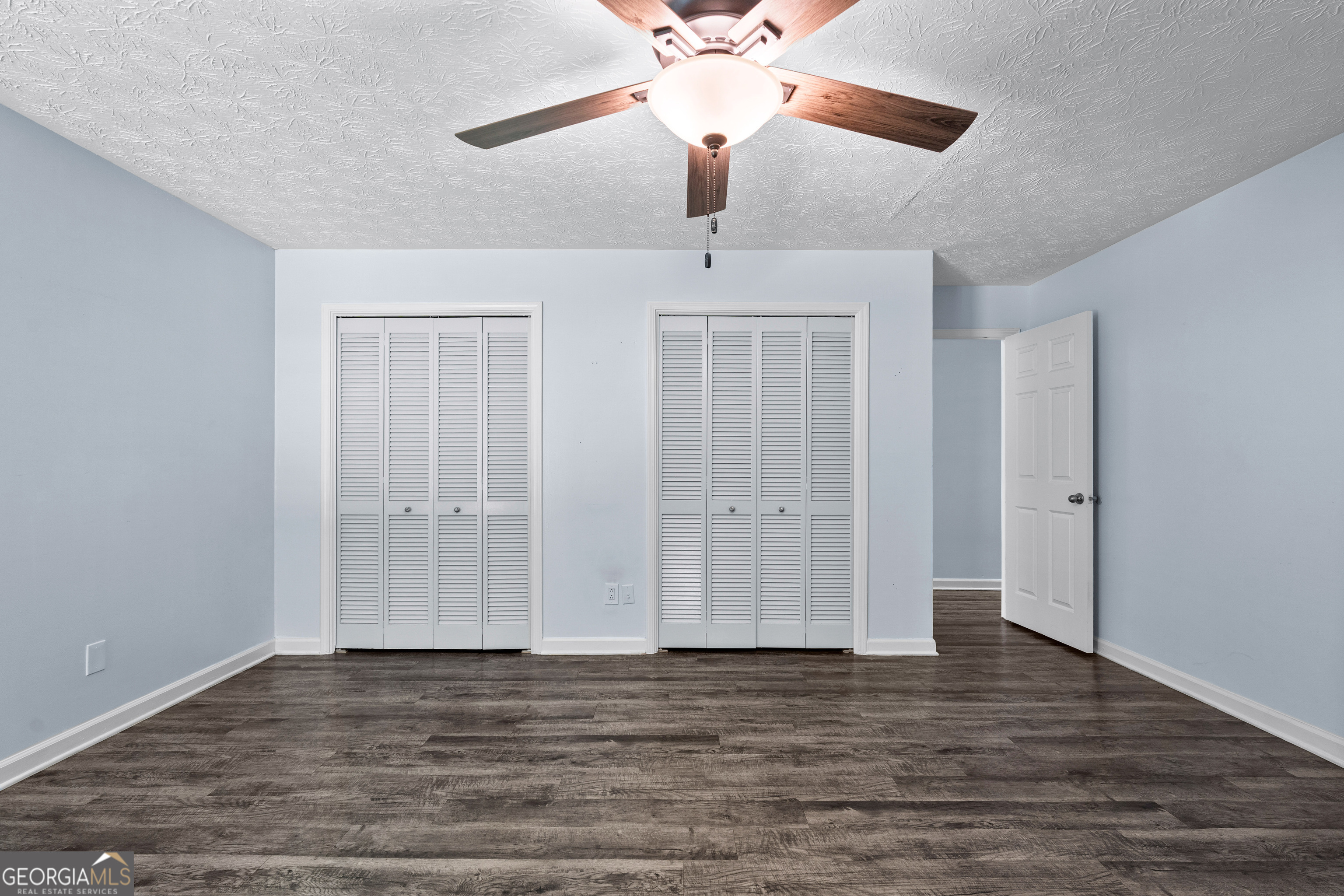 230 Ridge Road Tyrone, GA 30290 - Photo 21 of 47 a view of an empty room and wooden floor