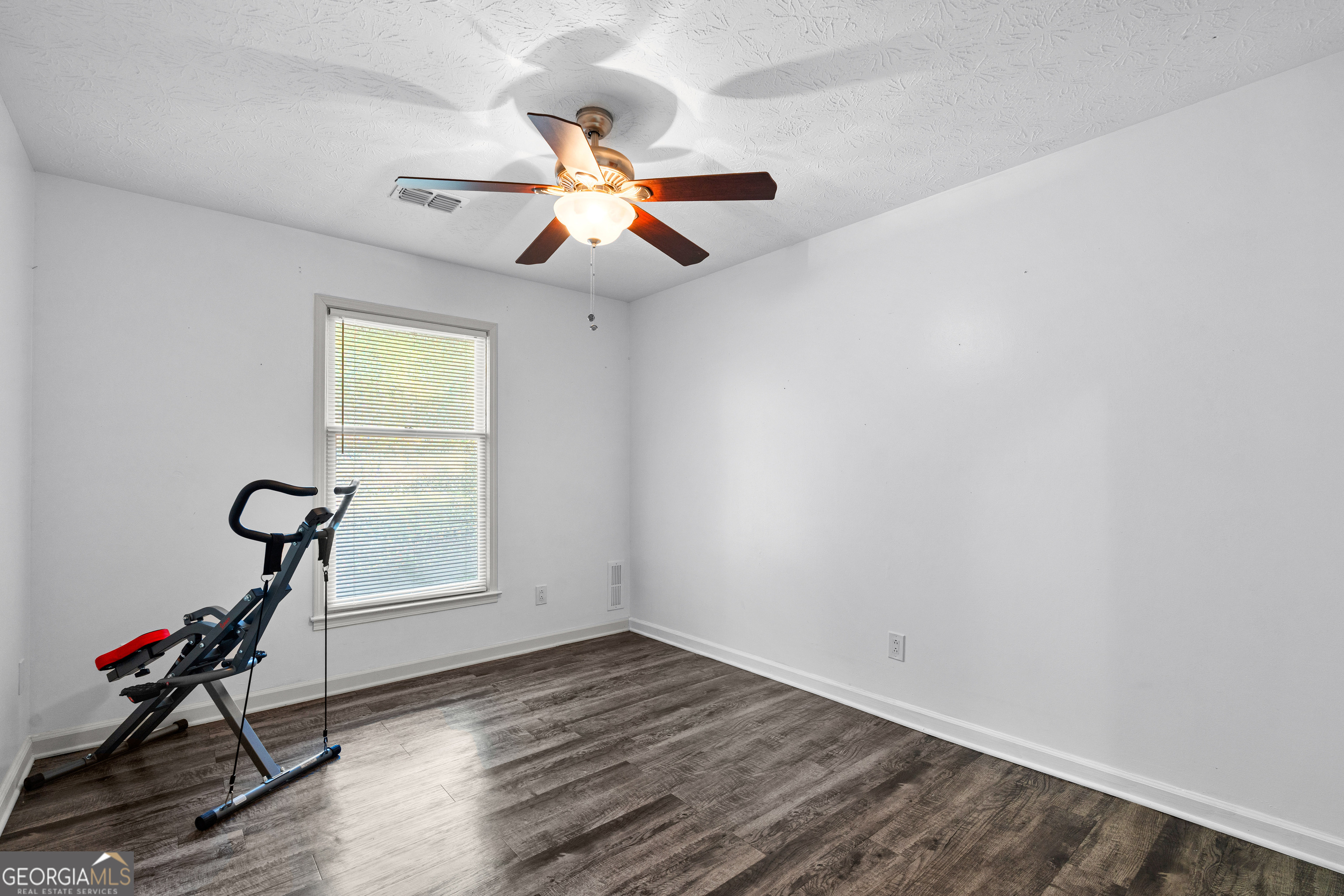 230 Ridge Road Tyrone, GA 30290 - Photo 24 of 47 a view of a room with wooden floor and windows