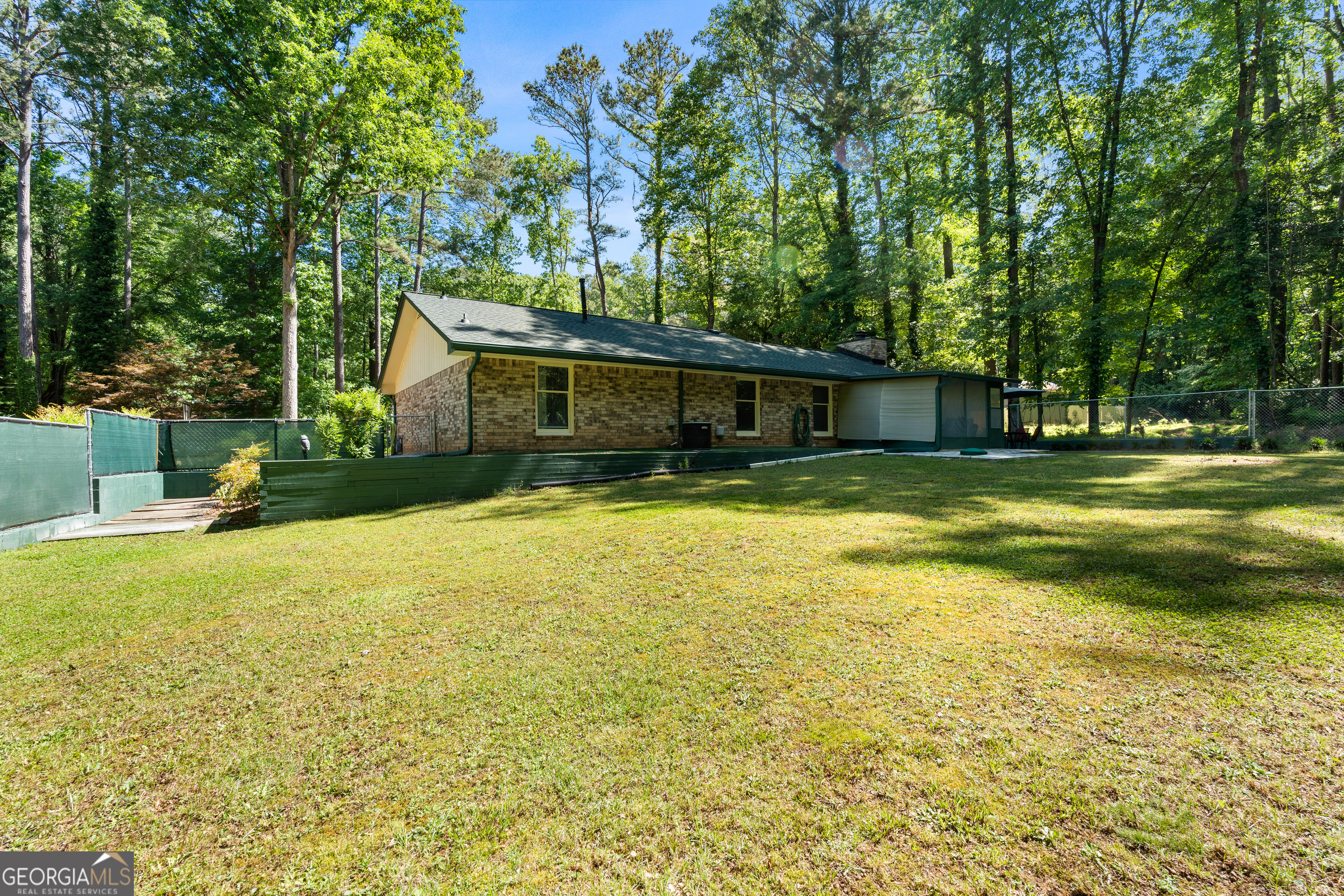 230 Ridge Road Tyrone, GA 30290 - Photo 44 of 47 a view of a house with a yard and a large tree
