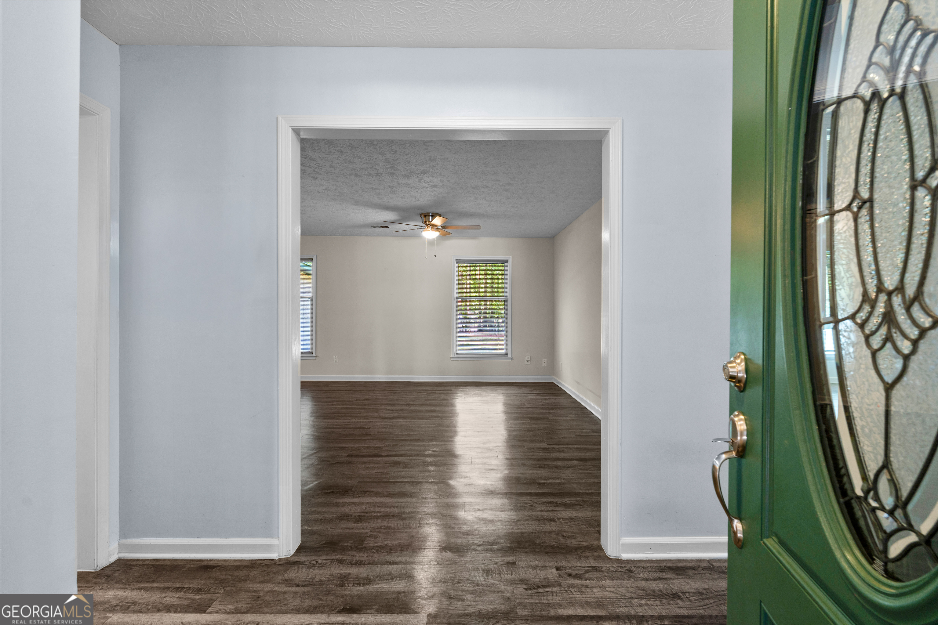 230 Ridge Road Tyrone, GA 30290 - Photo 6 of 47 a view of an entryway with wooden floor