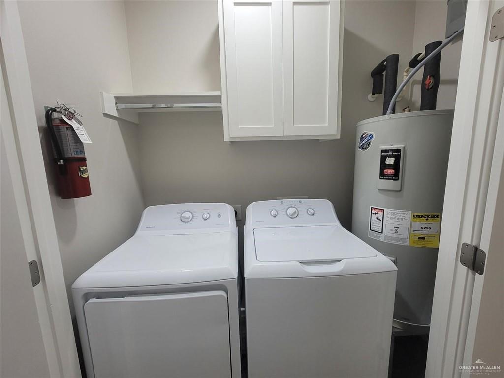 5901 Swallow Avenue, Unit 2 Mission, TX 78573 - Photo 10 of 11 a utility room with dryer and washer