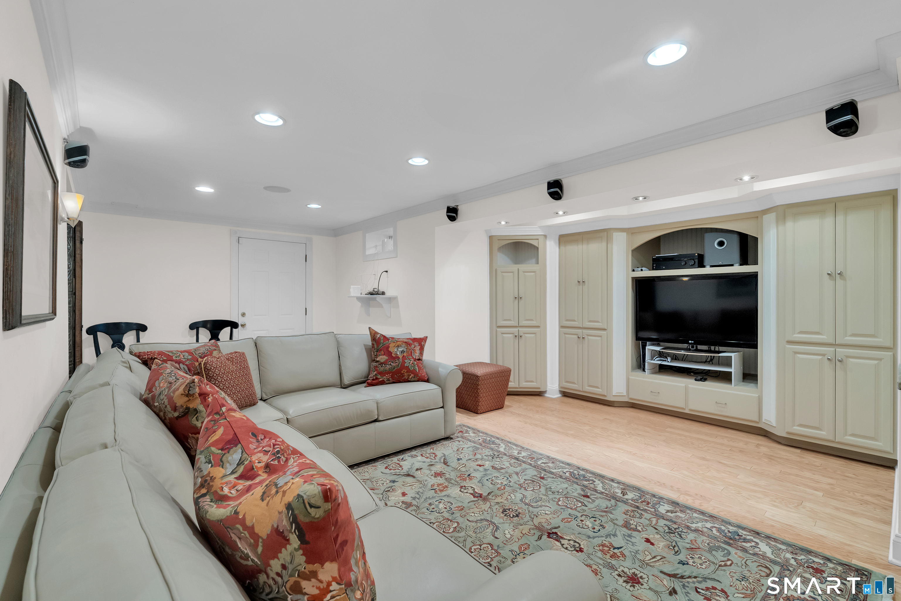 21 Stone Wall Road Salem, CT 06420 - Photo 30 of 38 a living room with furniture and a flat screen tv