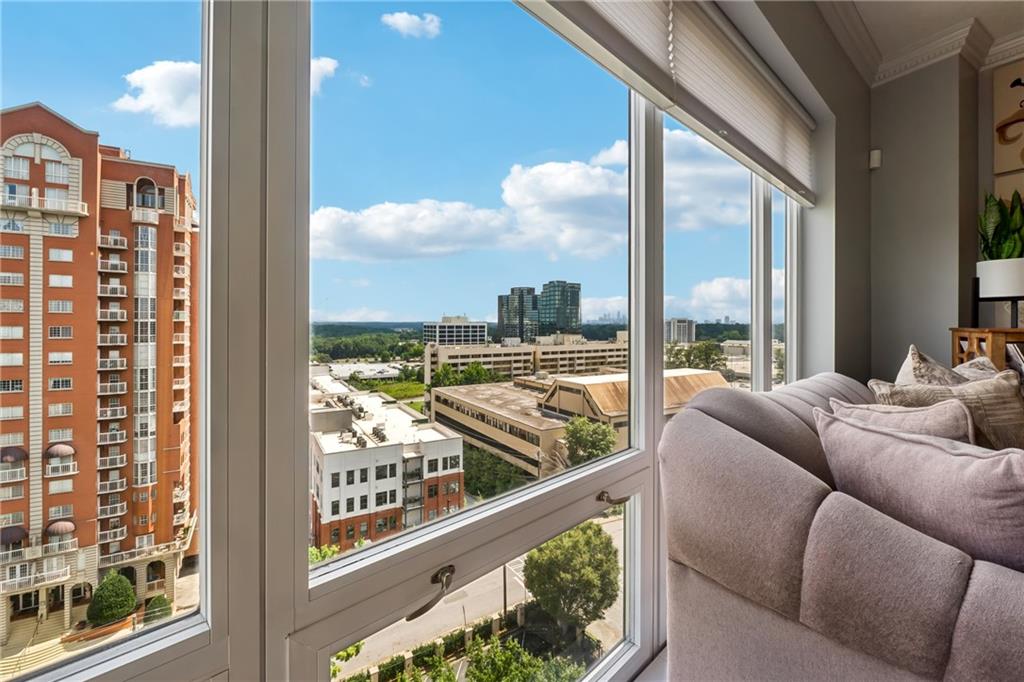 3475 Oak Valley Road Northeast, Unit 980 Atlanta, GA 30326 - Photo 2 of 42 a living room with furniture city view