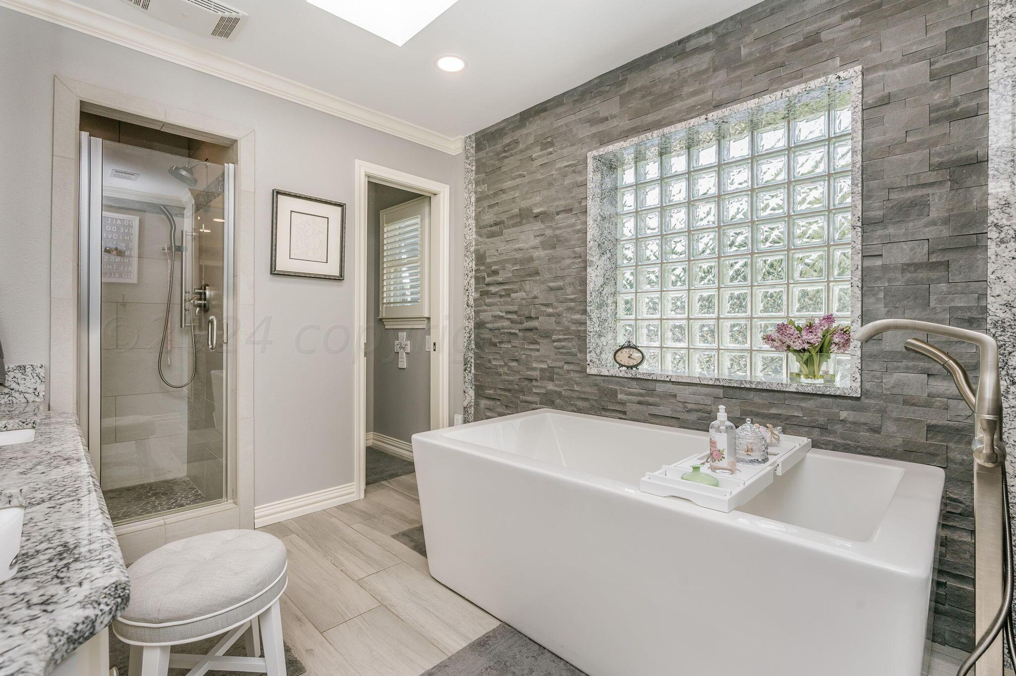 3518 Danbury Drive Amarillo, TX 79109 - Photo 12 of 59 a bathroom with a sink toilet and shower