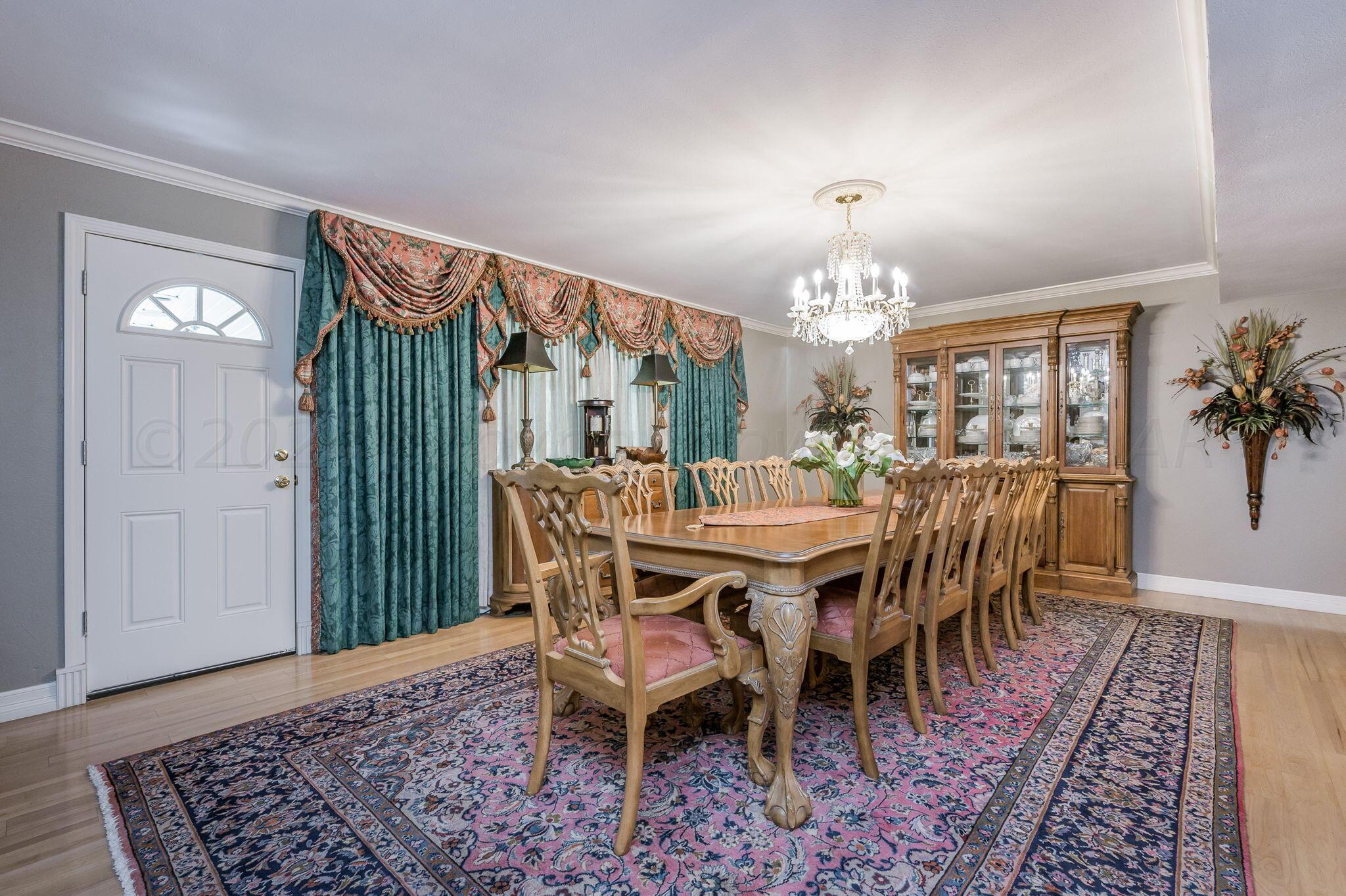3518 Danbury Drive Amarillo, TX 79109 - Photo 20 of 59 a view of a dining room with furniture window and wooden floor