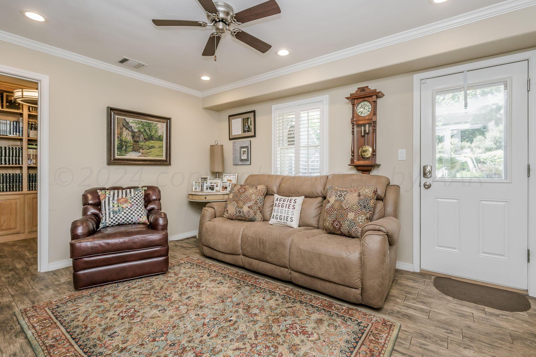3518 Danbury Drive Amarillo, TX 79109 - Photo 23 of 59 a living room with furniture and a window