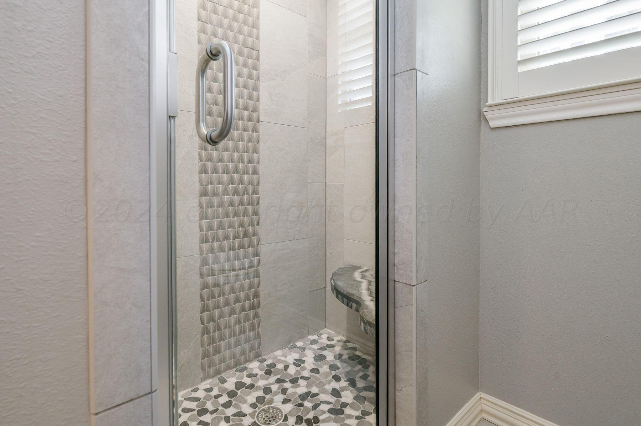 3518 Danbury Drive Amarillo, TX 79109 - Photo 30 of 59 a bathroom with a shower