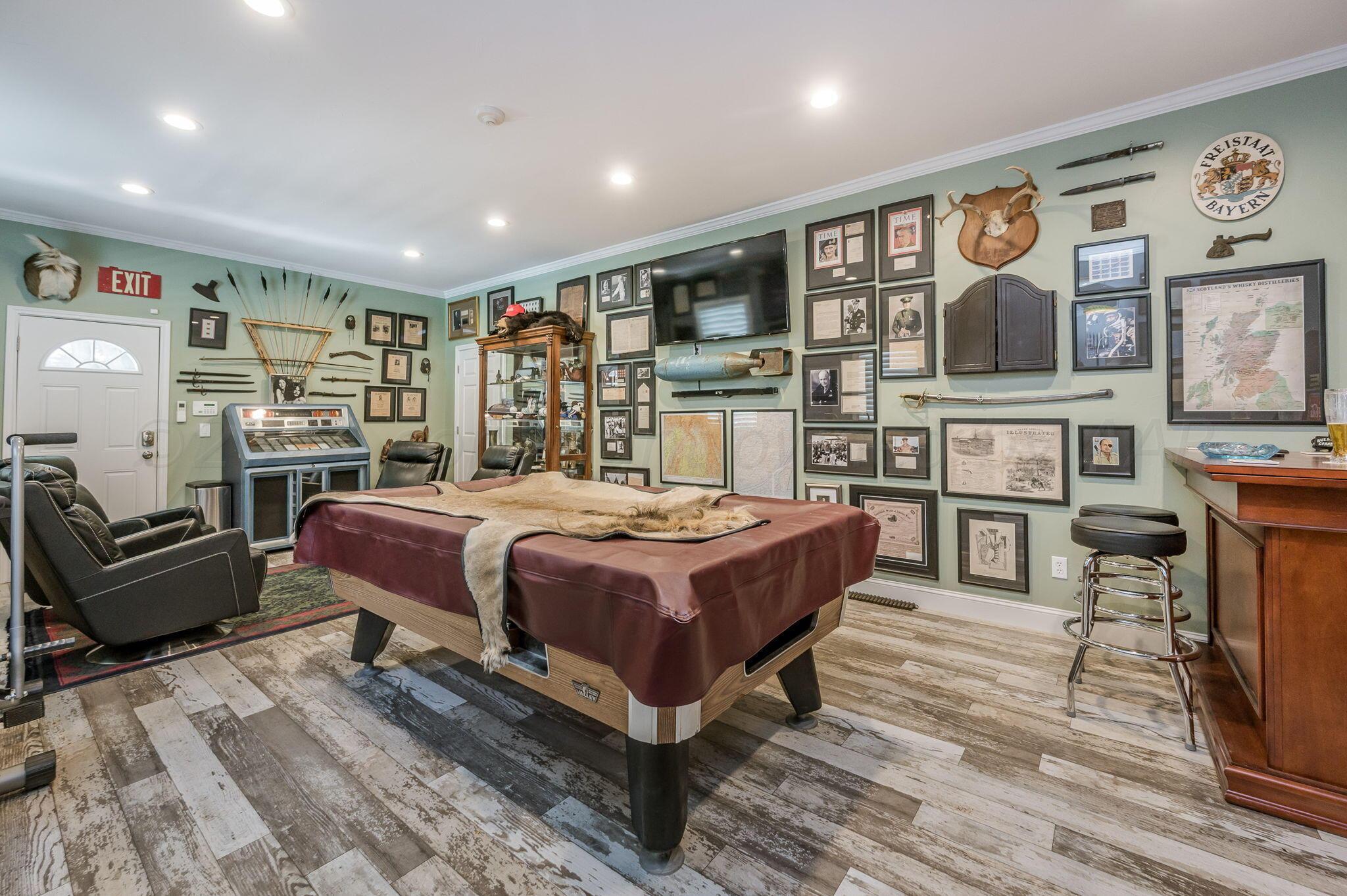 3518 Danbury Drive Amarillo, TX 79109 - Photo 40 of 59 a spacious bedroom with a large bed a flat tv screen and dresser