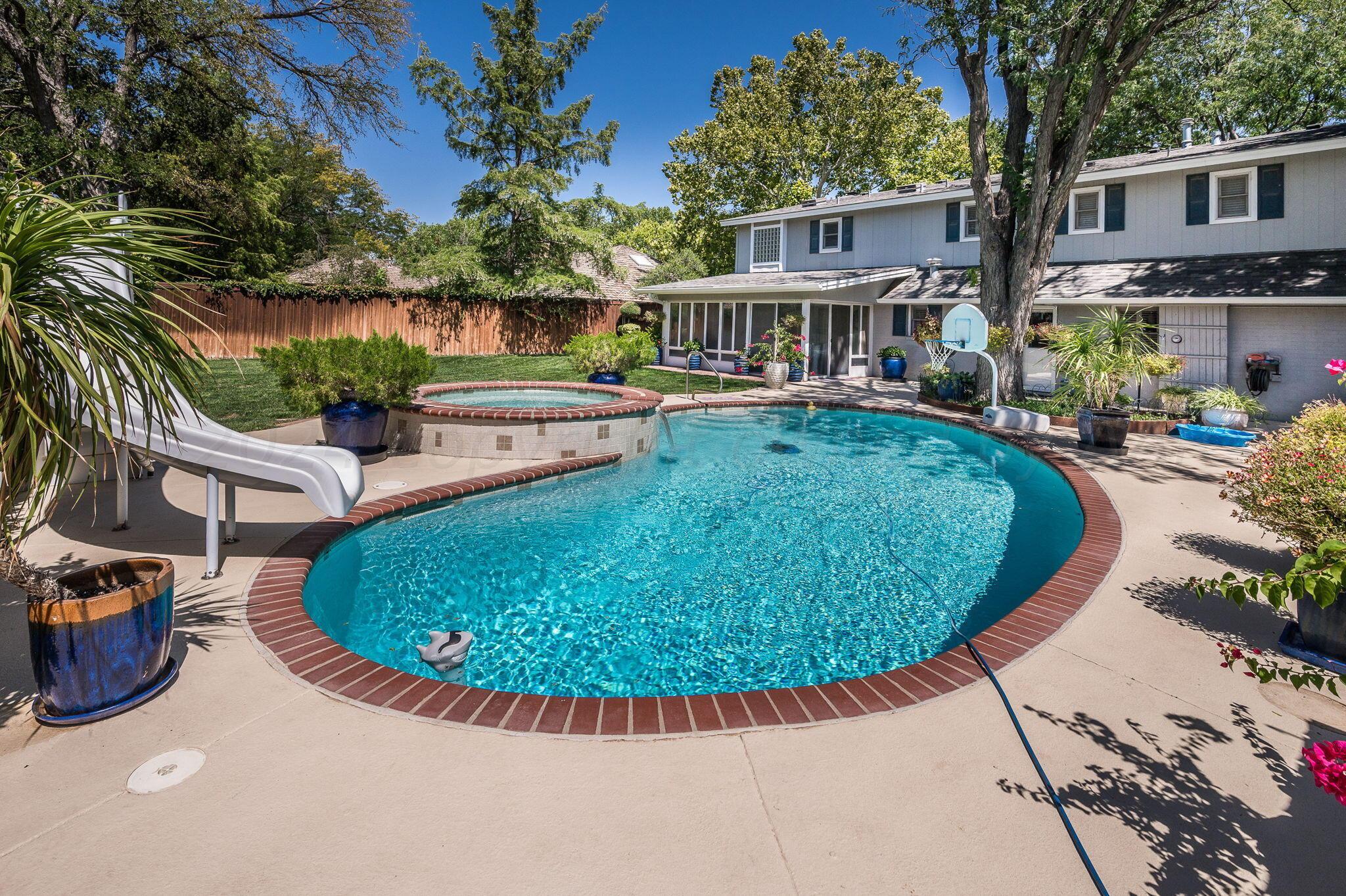 3518 Danbury Drive Amarillo, TX 79109 - Photo 55 of 59 a view of a house with swimming pool