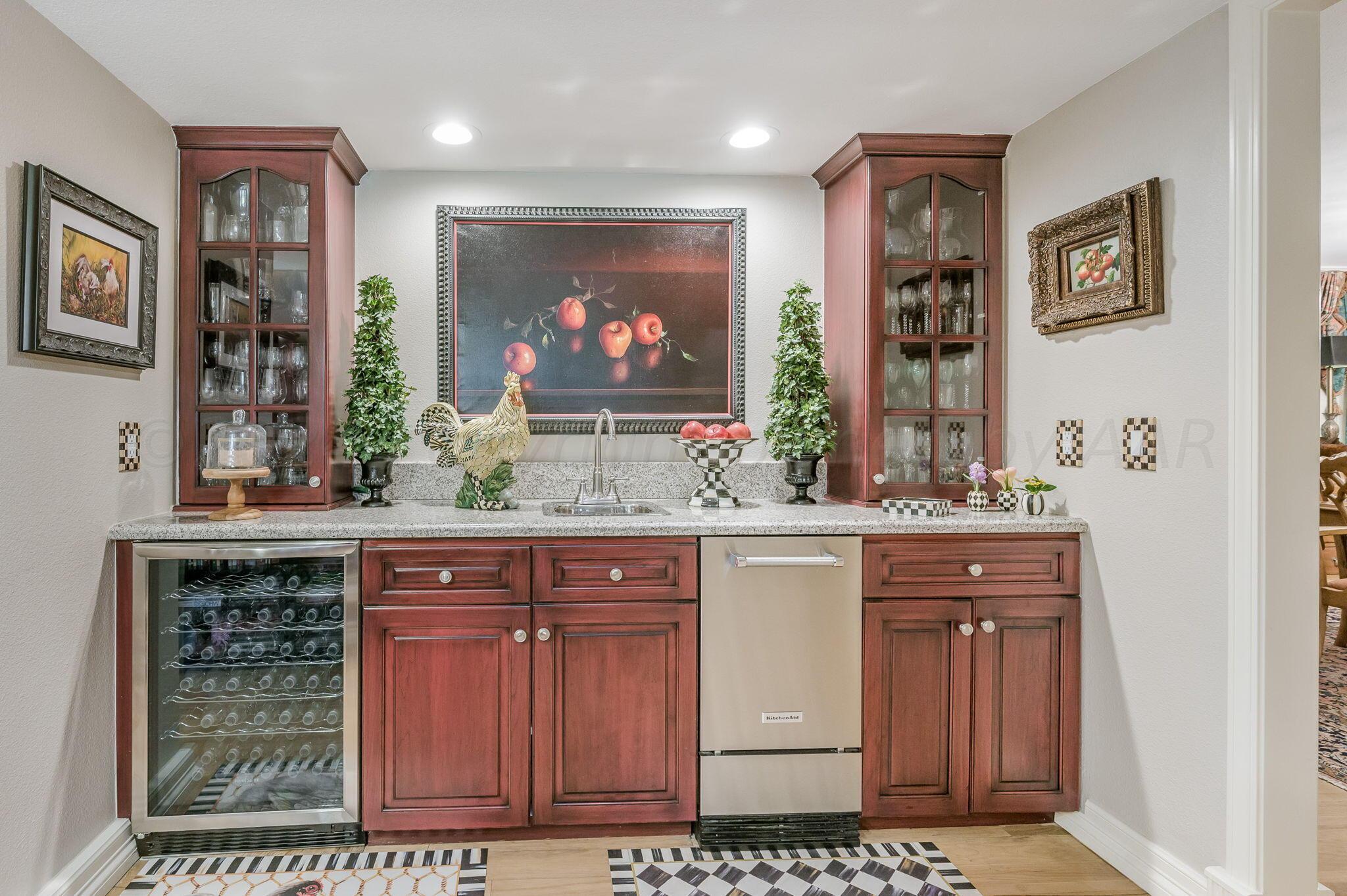 3518 Danbury Drive Amarillo, TX 79109 - Photo 7 of 59 a view of a kitchen with cabinets and a window