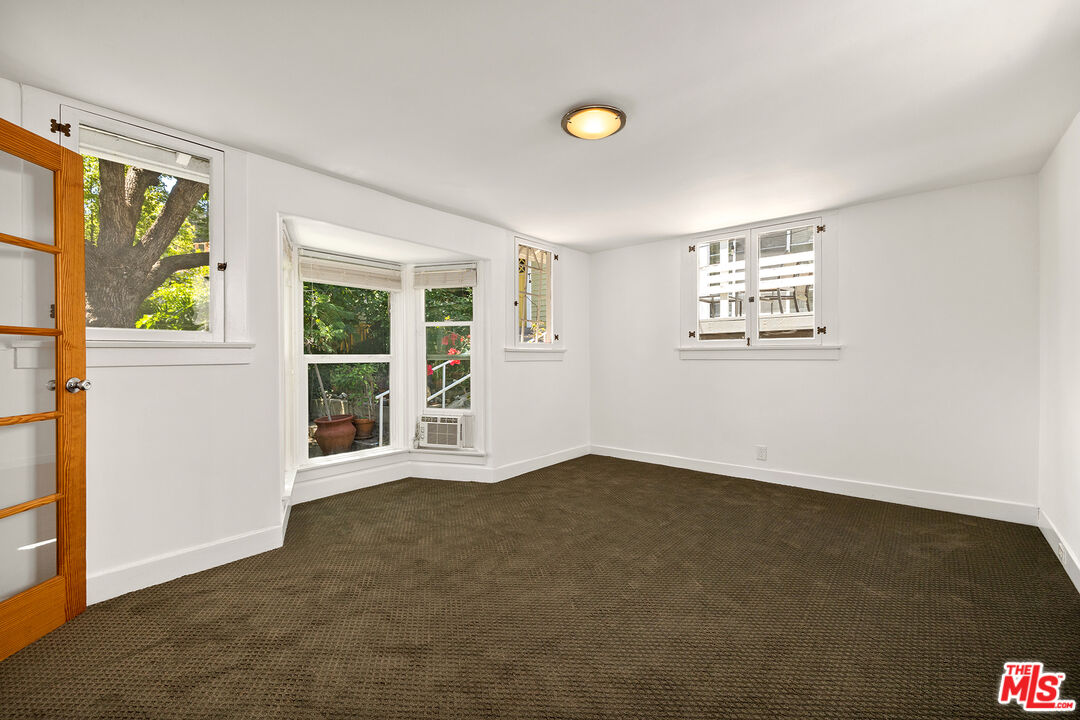 2105 Echo Park Avenue Los Angeles, CA 90026 - Photo 10 of 31 an empty room with windows