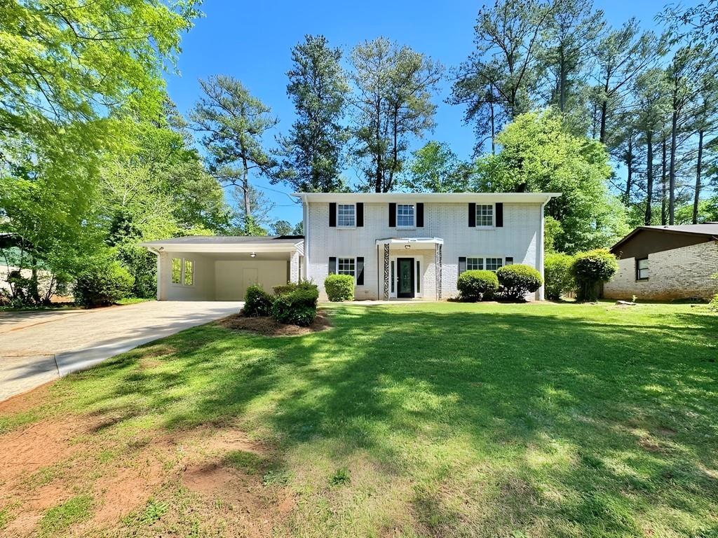 front view of a house with a big yard