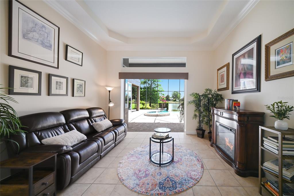 14806 Bowfin Terrace Lakewood Ranch, FL 34202 - Photo 15 of 58 a living room with furniture and a potted plant