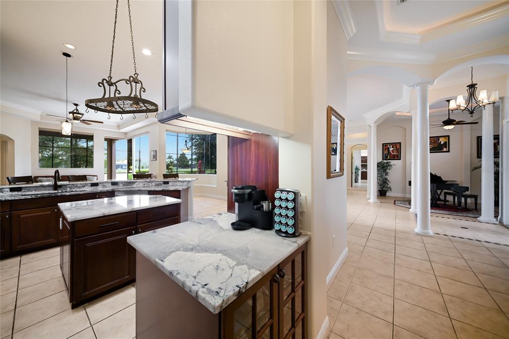 14806 Bowfin Terrace Lakewood Ranch, FL 34202 - Photo 22 of 58 a kitchen with a counter space cabinets and appliances